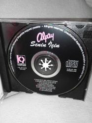 Cd Alpay senin için albümü. Orijinal 1991 pembe bandrollü dönem baskı albüm. Disk 10 üzerinden 9,5 çok iyi durumda sorunsuz çalışıyor koleksiyonluk