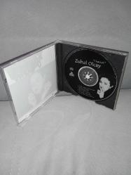 Cd Zuhal Olcay ihanet albümü. Orijinal Ada Müzik kırmızı bandrollü dönem baskı albüm. Kartonet tertemiz. Disk 10 üzerinden 9,5 çok iyi durumda sorunsuz çalışıyor koleksiyonluk