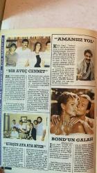 YENİ DÜNYA, VİDEO & MAGAZİN AYLIK VİDEO, SİNEMA, MAGAZİN DERGİSİ - TEMMUZ-AĞUSTOS 1985 - NAZAN SAATÇİ - CÜNEYT ARKIN - KARTAL BEY - HÜLYA AVŞAR - İBRAHİM TATLISES - MEHMET AYDIN - HÜLYA IŞIL - YADİGAR EJDER - SEVGİ SAYUNER - HİDAYET PELİT - KAZIM KARABEKİR - ÜMİT EFEKAN - MERAL ORHONŞAY - FARUK TANAZ - ERHAN CANAN - AYŞE TUNALI - BÜLENT BİLGİÇ - YILDIRIM GENÇER - BURT REYNOLDS - CLINT EASTWOOD  MELEK - NEŞELİ TATİL - PARA BABASI - KRALİÇE SHEENA - BLANCHE VE MARIE - BELA KAYNANA - MAVİ MAVİ - SUSKUN DUVARLAR - YUNUS GİBİ - ASSOLİST - HER DEVRİN KADINI - TERMİNATÖR - BEVERLY HILLS POLİSİ - CITY HEAT - KARTAL BEY - TAM TAKIM EKSİKSİZ 34 SAYFA