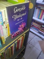 GERÇEKLE YÜZLEŞMEK