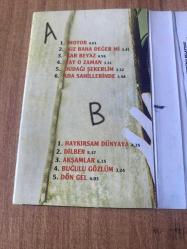 Kerim Tekin - Haykırsam Dünyaya Kaset ( İşaretli fotoğrafta, kartonet kulakçıkta küçük deformasyon var )