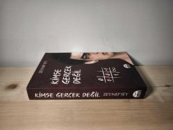 Kimse Gerçek Değil