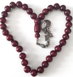 OSMANLI DÖNEMİ OBJEDEN YAPILMA KOYU KIRMIZI RENKLİ MUHTEŞEM SIKMA KEHRİBAR TESPİH GÜMÜŞ PÜSKÜLLÜ 1M2RR2 ÇOK NADİR