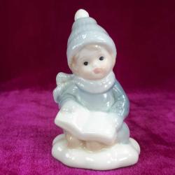 KİTAP OKUYAN KÜÇÜK ÇOCUK EL BOYAMA PORSELEN BİBLO