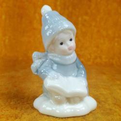 KİTAP OKUYAN KÜÇÜK ÇOCUK EL BOYAMA PORSELEN BİBLO