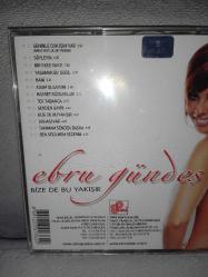Cd Ebru Gündeş bize de bu yakışır albümü. Orijinal 2004 baskı. Dinlemeyi etkilemeyen çizikler var sorunsuz çalışıyor