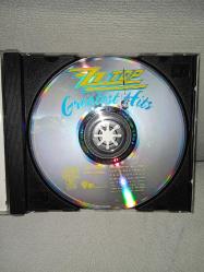 Cd ZZ Top greatest hits albümü. Orijinal Almanya baskı. Disk 10 üzerinden 9 sorunsuz çalışıyor.
