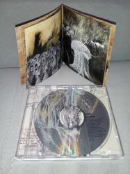 Cd Radiohead amnesiac. Orijinal 2001 Avrupa baskı. Dinlemeyi etkilemeyen çizikler var sorunsuz çalışıyor