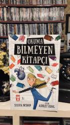 OKUMA BİLMEYEN KİTAPÇI