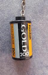 KODAK FİLM TEMALI ANAHTARLIK . FOTOĞRAFTA GÖRÜLDÜĞÜ GİBİDİR KOLEKSİYONLUK NADİR