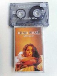 NİRAN ÜNSAL - ŞARKILARA TUTUNDUM -  TÜRKİYE 1999 BASIM - KASET ALBÜM