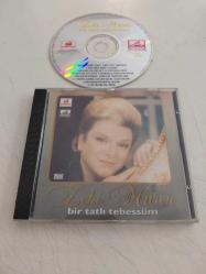 Zeki Müren – Bir Tatlı Tebessüm - 1994 Türkiye  Basım CD Albüm-2.el