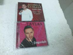 İZMİRLİ TAYLAN ÇINGIRDAK+ASLAN GİBİ 2 CD SIFIR  SIFIR ORJ BANDROLU