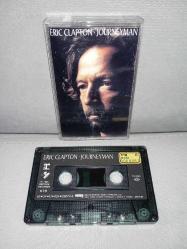 Kaset Eric Clapton journeyman albümü. Orijinal 1989 dönem Kağıt Baskı. Kaset sorunsuz çalışıyor. Kartonetin sayfaları birbirine yapışık.