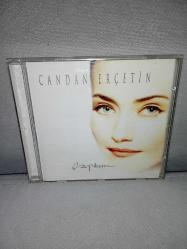 Cd Candan Erçetin çapkın albümü. Orijinal sarı bandrollü dönem baskı albüm. Dinlemeyi etkilemeyen çizikler var sorunsuz çalışıyor