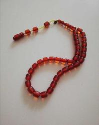 Şükrü baba ustalığıyla kehribar tesbih