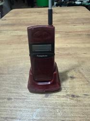 Dekorluk Koleksiyonluk Retro Panaphone Telsiz Telefon - Bordo Hem nostalji tutkunları hem de dekorasyonuna retro bir hava katmak isteyenler için harika bir parça. Dış kozmetiği fotoğraflarda görüldüğü gibi temizdir. El terminali ve şarj standı ile birlikte verilecektir. Şarj kablosu ve bataryası yok dekorluk