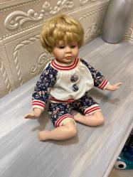 hikayeli ağlayan porselen bebek