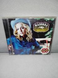 CD Madonna music albümü. Orijinal. Disk 10 üzerinden 9 sorunsuz çalışıyor koleksiyonluk