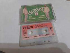 ZEKİ ALASYA METİN AKPINAR DELİLER  KAĞIT BASKI KASET