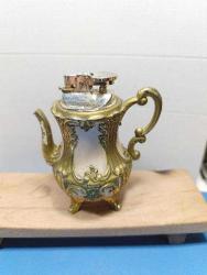 MSÇ7---ÇAYDANLIK ŞEKLİNDE KAİDELİ ESKİ GAZLI MASA ÇAKMAĞI -ÇALIŞMIYOR