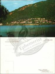 Fethiye, Karagözler Mahallesi, Kartpostal, 1970’ler: Kıyı yerleşimi, yamaçlara yayılan evler, sakin deniz yüzeyi ve çevrede ormanlık alanlar.
