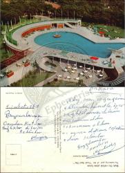 İzmir, Büyük Efes Oteli, Kartpostal, 1969: Modern mimarili otel kompleksi, dairesel yüzme havuzu, şezlonglar ve bahçe düzeniyle dönemin turistik görünümü.