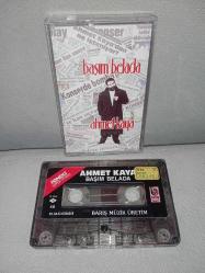 Kaset Ahmet Kaya başım belada albümü. Orijinal 1991 dönem Kağıt Baskı. Temiz,  sorunsuz çalışıyor koleksiyonluk