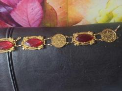 Çelik üstü kaplama zirkon taşlı osmanlı tuğra ve replika para lar.ile yapılmış 80 cm uzunluğunda el yapımı kemet