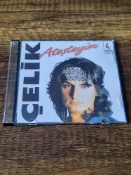 ÇELİK - ATEŞTEYİM  --ESKİ DÖNEM BASKISI MÜZİK CD Sİ-(AÇIKLAMAYI OKUYUNUZ)
