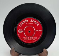 ZERİN ZEREN TATLI DİLE GÜLER YÜZE 45 LİK PLAK