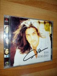 çelik sevdan gözümün bebeği cd (kapak sanatcı tarafından 'nuray'a evgilerimle' şeklinde imzalanmış) (çok temiz kondisyonda)