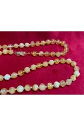 17,5 gram damla kehribar kolye - taneler ortalama 6 mm çapında açık halde toplam uzunluk 64 cm