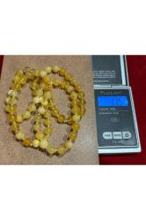 17,5 gram damla kehribar kolye - taneler ortalama 6 mm çapında açık halde toplam uzunluk 64 cm