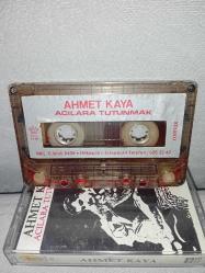 Kaset Ahmet Kaya acılara tutunmak albümü. Orijinal sorunsuz çalışıyor koleksiyonluk