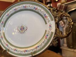 Pirinç ve porselenin zerafeti Limoges el boyama sunum tabağı 35,5 cm 22 cm ölçülerinde.