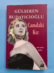 CAMDAKİ KIZ