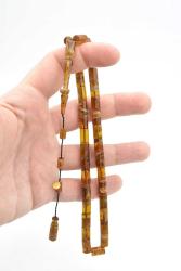 Hakan Turan İmzalı Kesme Model Hareli Kahverengi Sıkma Kehribar Tesbih