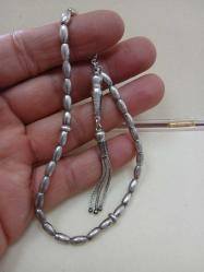 GÜMÜŞ TESBİH, BİLEKBOY