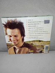 Cd Tarkan dudu albümü. Orijinal. Dinlemeyi etkilemeyen yoğun çizikler var sorunsuz çalışıyor.