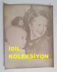 BİRLEŞİK KRALLIK ESKİ BAŞBAKANI MARGARET THATCHER'IN HABER AJANSI BASIM FOTOĞRAFI - NEWS AGENCY PHOTO OF FORMER UNITED KINGDOM PRIME MINISTER MARGARET THATCHER - 23 x 18 cm EBADINDA - MARGARET THATCHER, KUCAĞINDA TUTTUĞU SEVİMLİ BİR BEBEKLE GÜLÜMSERKEN ÇEKİLMİŞ BİR KARE..- İNGİLTERE SİYASET TARİHİ - (A PHOTOGRAPH OF MARGARET THATCHER SMILING WHILE HOLDING A LOVELY BABY IN HER ARMS.)