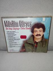 CD Müslüm Gürses  Bir avuç gözyaşı tövbe etmek. Orijinal 1995 kırmızı bandrollü dönem baskı albüm. Disk ve kartonet 10 üzerinden 9.9 çok iyi durumda sorunsuz çalışıyor. NADİR koleksiyonluk