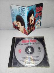 CD Müslüm Gürses  Bir avuç gözyaşı tövbe etmek. Orijinal 1995 kırmızı bandrollü dönem baskı albüm. Disk ve kartonet 10 üzerinden 9.9 çok iyi durumda sorunsuz çalışıyor. NADİR koleksiyonluk