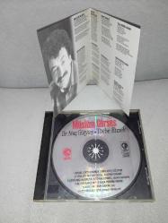 CD Müslüm Gürses  Bir avuç gözyaşı tövbe etmek. Orijinal 1995 kırmızı bandrollü dönem baskı albüm. Disk ve kartonet 10 üzerinden 9.9 çok iyi durumda sorunsuz çalışıyor. NADİR koleksiyonluk
