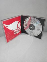 Cd Aerosmith – Aerosmith’s Greatest Hits. Orijinal Amerikan baskı. Dinlemeyi etkilemeyen çizikler var. sorunsuz çalışıyor. Kartonet tertemiz koleksiyonluk