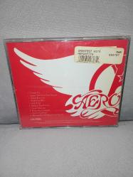 Cd Aerosmith – Aerosmith’s Greatest Hits. Orijinal Amerikan baskı. Dinlemeyi etkilemeyen çizikler var. sorunsuz çalışıyor. Kartonet tertemiz koleksiyonluk
