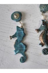 Deniz Atı Küpe Retro Dönem Ürünü. Kullanılmamış temiz durumda. Retro dönem ürünü