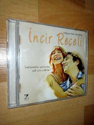 incir reçeli orijinal film müzikleri cd (disk çok temiz; belki 10 kadar kılcal çizik var, performansı etkileyecek kadar değil) (arka kapakta su lekeleri var, ikinci fotoğrafa bakınız)