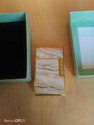 Kutusunda Dupont Çakmak. Gazlı. Çalışır. Sıfır ürün. Çok iyi metalik kapak sesi var