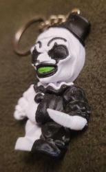 SIFIR, KULLANILMAMIŞ ART THE CLOWN FİGUR. ANAHTARLIK.